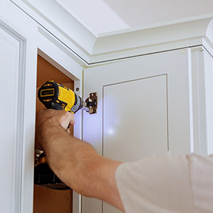 Install your custom pullout cabinet shelves with Art of Drawers